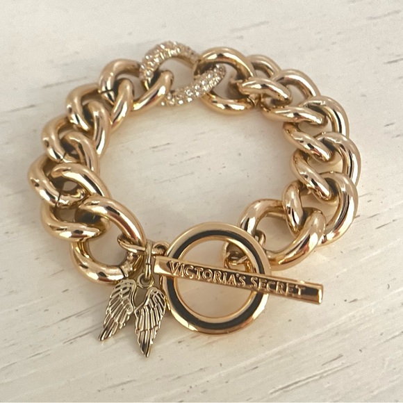 Victoria's Secret Jewelry - VICTORIA'S SECRET Gold-Tone Rhinestone Angel Wing Charm Curb Chain Bracelet